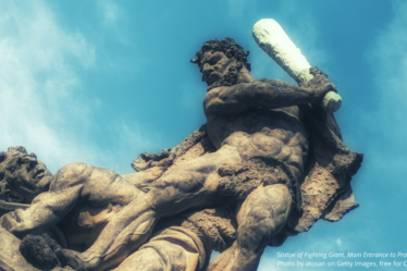 Statue of Fighting Giant, Main Entrance to Prague Castle Photo by atosan on Getty Images, free for Canva Pro